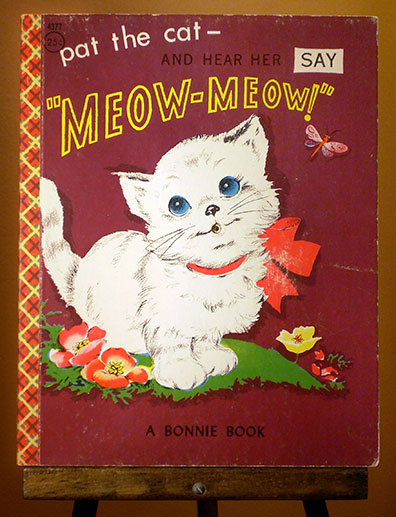 pat the cat and hear her say "Meow-Meow!" Book No. 4377